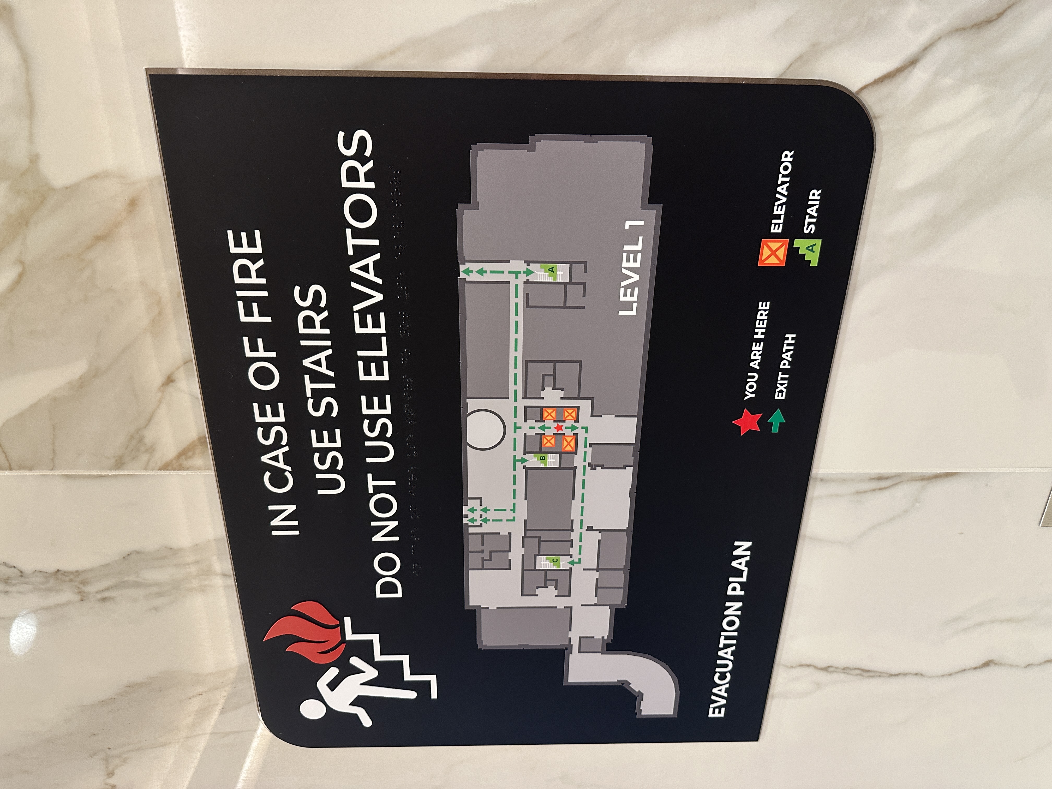 ADA room sign with Braille